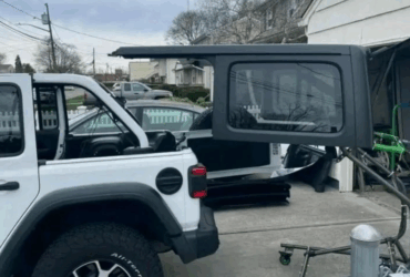 TopLift Pro with motor for one push lift on the Jeep Wrangler top