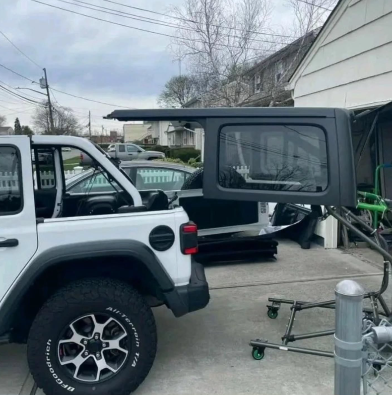 TopLift Pro with motor for one push lift on the Jeep Wrangler top